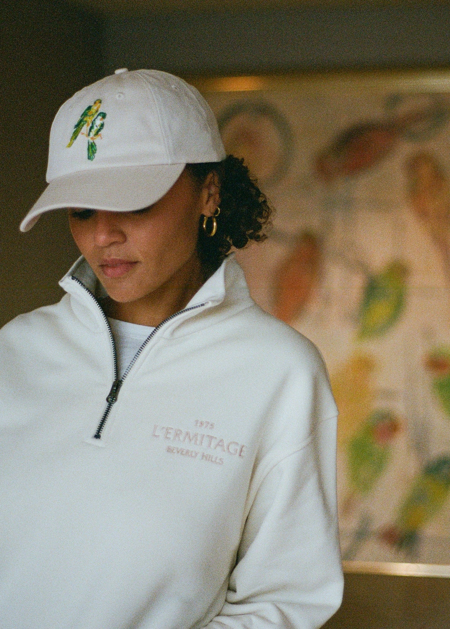 Woman wearing the L'Ermitage Beverly Hills x Dinner Service NY dad hat.