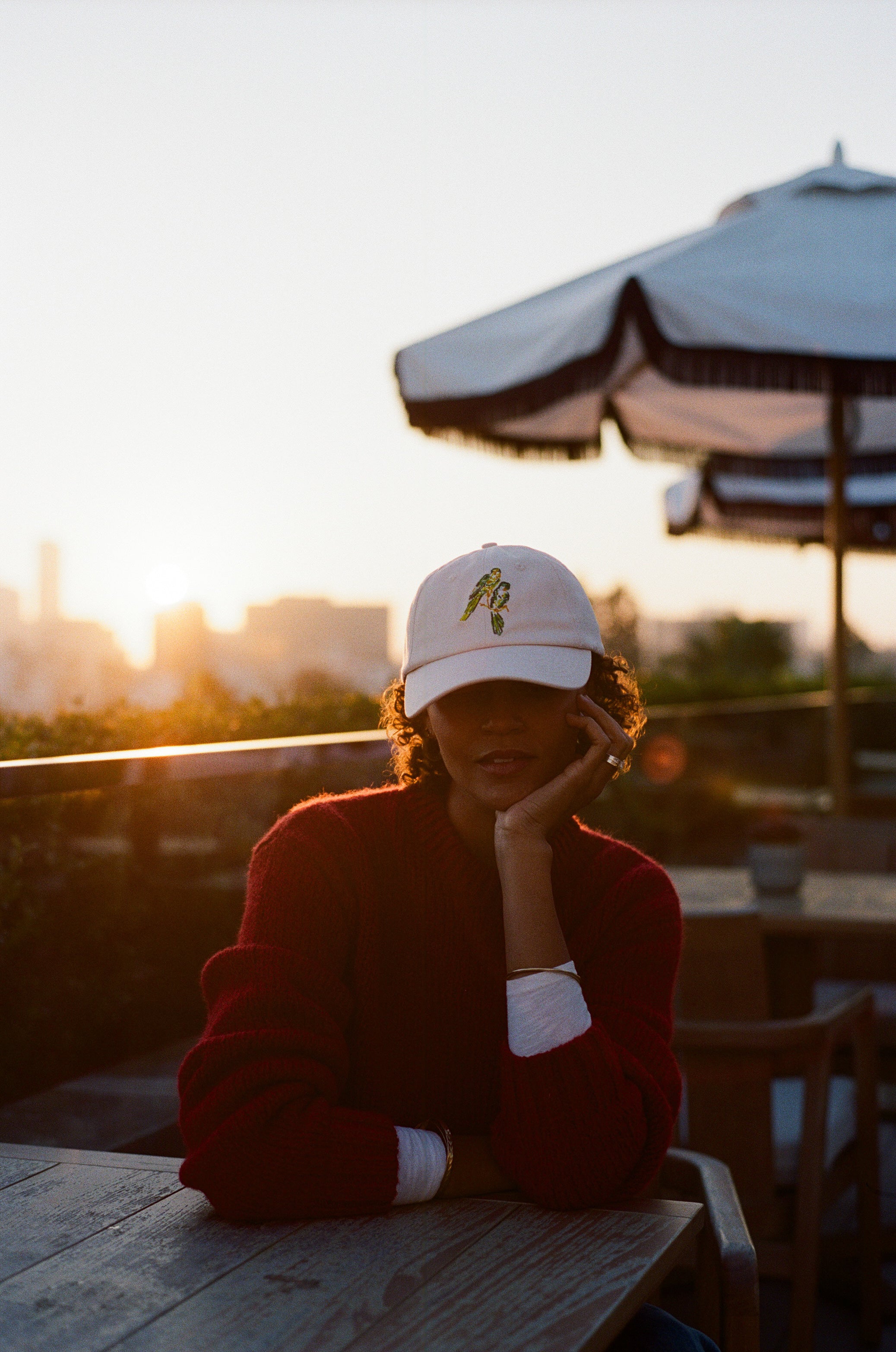 Woman wearing the L'Ermitage Beverly Hills x Dinner Service NY dad hat.